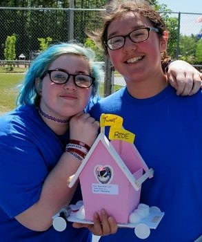 South Meadow School students with their creative, birdhouse-themed car, 