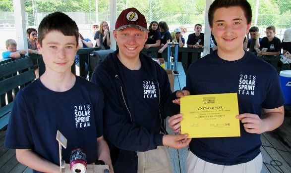 Zach Coll, Eli Richardson & Gabe Paige of Saint Joseph Regional School, with their winning 