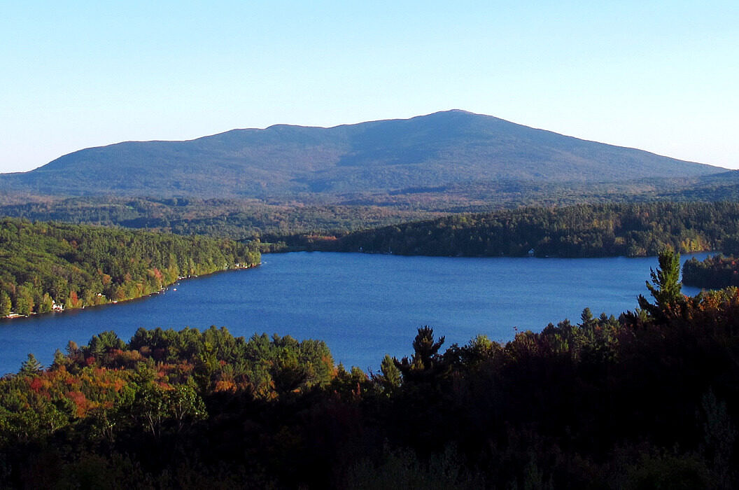 Mount Monadnock in the distance, with Silver Lake in the foreground. 