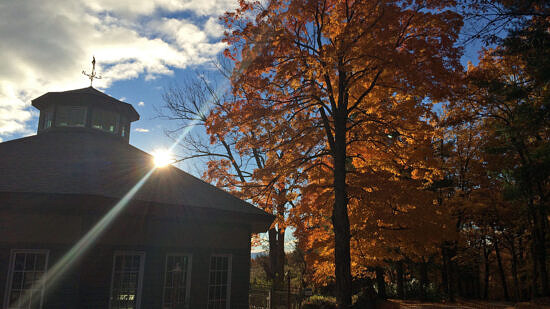 The Harris Center building and autumn trees (Photo by Dottie Cullinane)