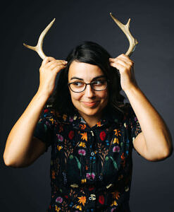 A whimsical photo of Rosemary Mosco holding antlers up to her forehead. (courtesy photo)