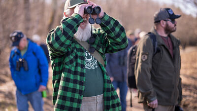 Veterans hiking and looking for birds (photo © Ben Conant)