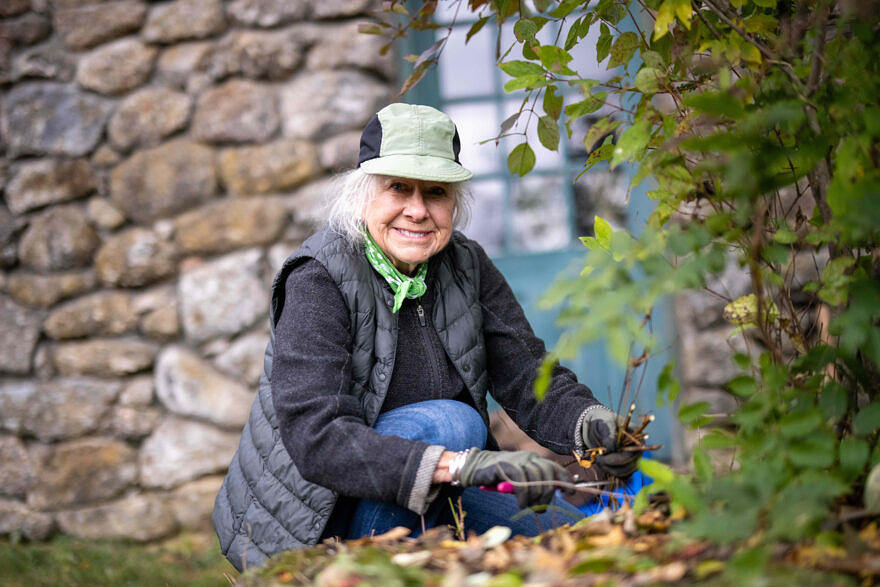 Volunteer Peggy Howard working in the Harris Center garden (photo © Ben Conant)