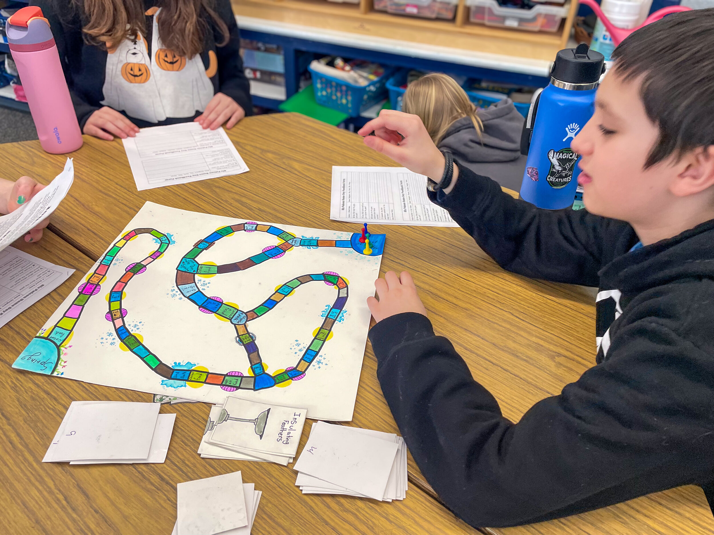 Students play one of the Peregrine Falcon survival games the group designed together (photo © Jenna Spear)