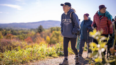 Hikers exploring the accessible trail at Crotched Mountain (photo © Ben Conant)