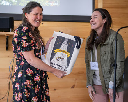Board Chair Tara Kessler (right) thanked outgoing trustees Daniel Henderson and Denise Zimmer (left) for their years of service. (photo © Ben Conant)